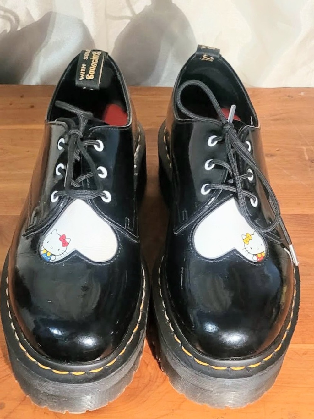 Dr. Martens Black Patent Platform Oxfords with Hello Kitty Heart Details